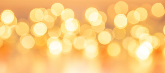 Abstract Banner with unsharp golden lights and bubbles at chtistmas time