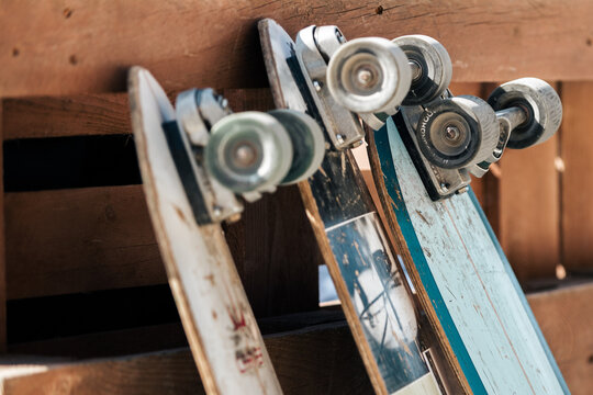 skateboards on a wooden pallet background