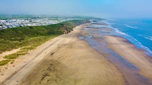 Cliffs and beach at Blackhall Rocks and Cromdon Dene Beach
