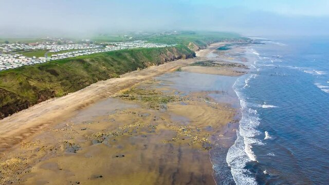 Cliffs and beach at Blackhall Rocks and Cromdon Dene Beach