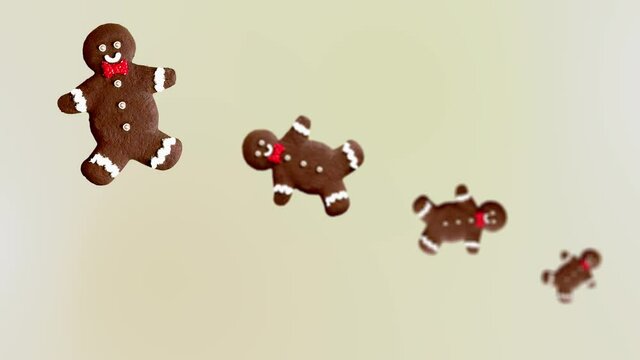A stream of Gingerbread Man. Christmas gingerbreadof different diameters diameters on a white color background. 4K UHD footage. Futuristic design, motion design animation. Pop art design, creative Chr