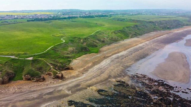 Cliffs and beach at Blackhall Rocks and Cromdon Dene Beach