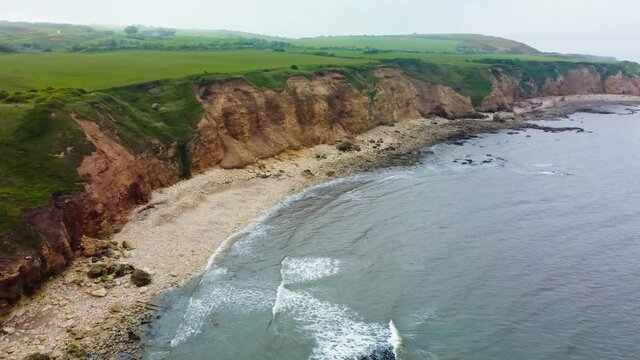 Cliffs and beach at Blackhall Rocks and Cromdon Dene Beach