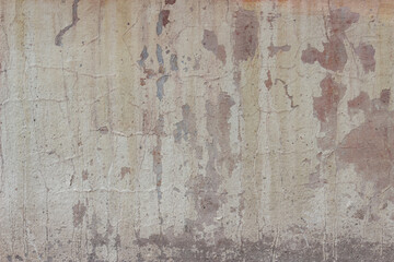 Old wall covered with cement. Beautiful wall with a lot of cracks and spots	

