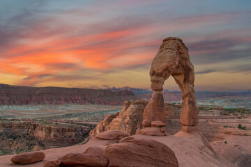 Fototapeta na wymiar Sunrise over Delicate Arch in the Arches National Park