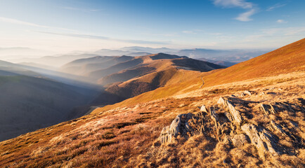 Bright landscape in the Carpathians. Mountain travel, freedom and active lifestyle concept. The beauty of the Carpathian Mountains. Bright photowall-paper. Late fall.