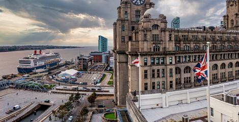 British UK flag on top of the building in Liverpool, UK. Aerial view of the UK flag.