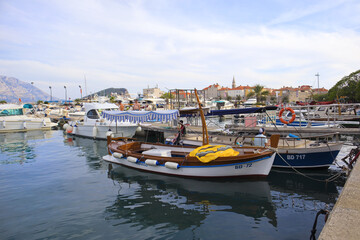 Fototapeta na wymiar Yachts and boats in the Budensky Bay in Budva, Montenegro