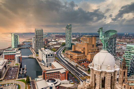 Aerial view of the Liver birds statue taken in the sunrise over Liverpool city in England.