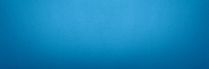 Blue textured paper background. Panorama texture blue cardboard seamless pattern. Large format...