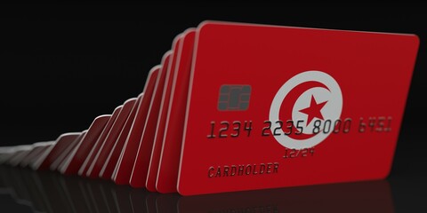Falling plastic cards with flag of Tunisia on dark background, fictional data on card mockups. Economic crisis conceptual 3d rendering