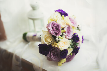 Beautiful wedding bouquet with different flowers, roses