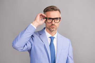optical eyecare. guy look like nerd. smart and confident businessman in suit.