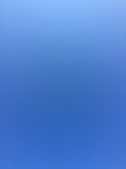 looking up at a deep blue sky for background