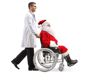 Full length profile shot of a doctor pushing santa claus in a wheelchair