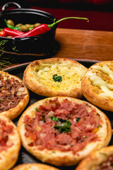 Delicious Pizza Classic Homemade Tomato Sauce Sausage Cheese Onion Meat Pasta Shrimp Restaurant Menu Gourmet on a wooden table