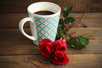 A romantic coffee, with a red rose