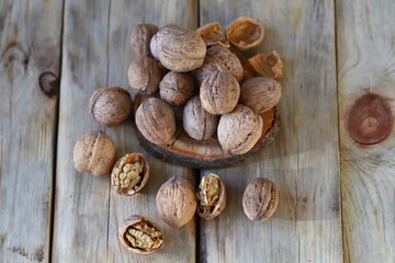 Selective focus. Walnuts on a wooden surface.