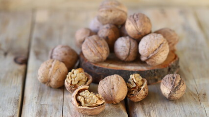 Selective focus. Walnuts on a wooden surface.