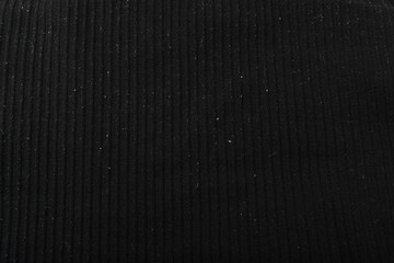 Pellets on black clothes