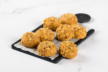 Vegan Peanut cookies on a serving board on a white background