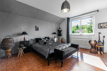 Luxury bedroom with concrete wall and wooden floor