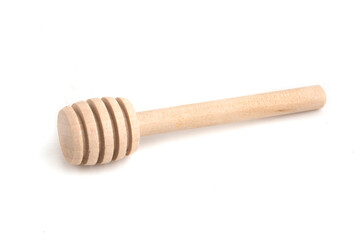 stick of honey on white background