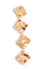 pieces of italian turon on white background