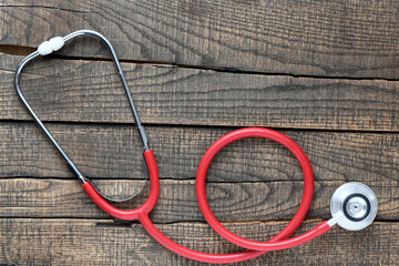 Stethoscope on wooden background. Heart health, health insurance concept, world heart day, world health day, world hypertension day