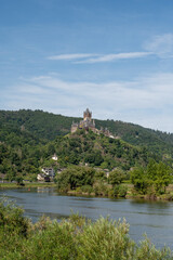 Fototapeta na wymiar View on Mosel river, hills with vineyards and castle in old town Cochem, Germany, Germany