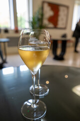 Tasting of brut champagne sparkling wine during visit caves in champagne house in Reims, France