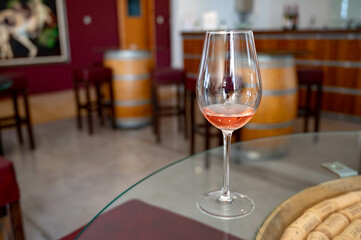 Wine industry of Cyprus island, tasting of rose dry wine on winery located on south slopes of Troodos mountain range.