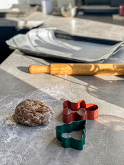 cookie dough, rolling pin and baking sheet