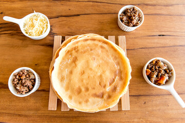 Meat pancake, typical Brazilian pancake, cheese and meat