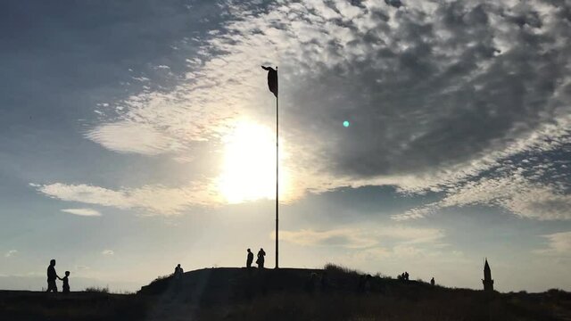 People silhouette at Van Castle top in Eastern Anatolia, Turkey. City of Van has a long history as a major urban area.