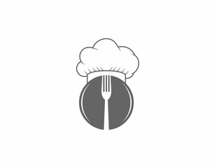 Plate with chef hat and fork in the middle