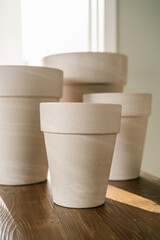 The texture of terracotta pots in close-up.