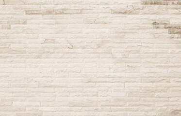 Empty background of wide cream brick wall texture. Beige old brown brick wall concrete or stone textured  design backdrop.