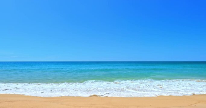 Sand beach slow motion waves and blue sky. No people landscape