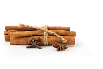 cinnamon tied with hemp rope,
Chinese anise. isolated on white background.