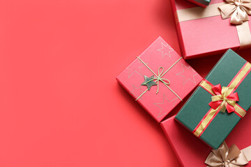 Different Christmas gift boxes on red background