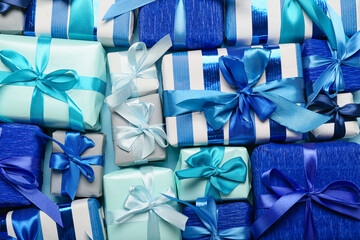 Many Christmas gift boxes as background