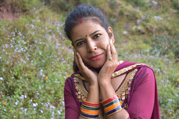 Fototapeta premium Beautiful and Young Indian Woman portrait with nature background