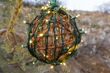 christmas tree decoration lit with christmas lights