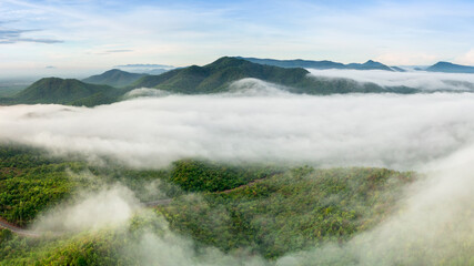 Beautiful aerial view sea of fog in the morning forest mountent with green mountains. Nong Ya Plong, Phetchaburi, Thailand