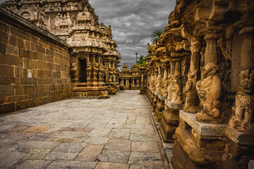 Fototapeta na wymiar Beautiful Pallava architecture and exclusive sculptures at The Kanchipuram Kailasanathar temple, Oldest Hindu temple in Kanchipuram, Tamil Nadu - One of the best archeological sites in South India