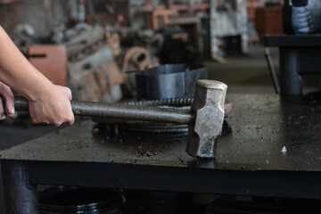 A portrait of some people holding hand tool maintenance. Such as hummer. 