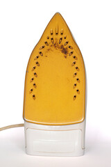Dirty electric iron with burnt stains isolated on white background included clipping path.