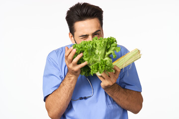 Cheerful dietitian with vegetables in hands vitamins healthy food