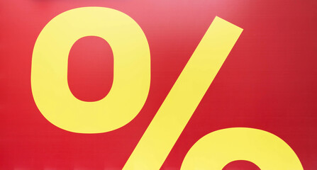 Yellow percent sign on a red background. Promotion, discounts, sale. Banner